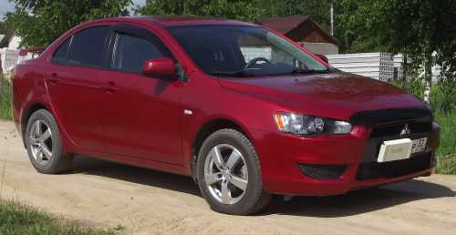 Mitsubishi lancer, 2008, 430000 .